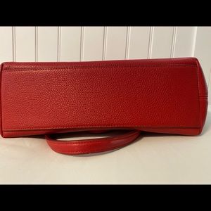 Red with silver hardware Coach purse. 14” x 8  Very good condition.